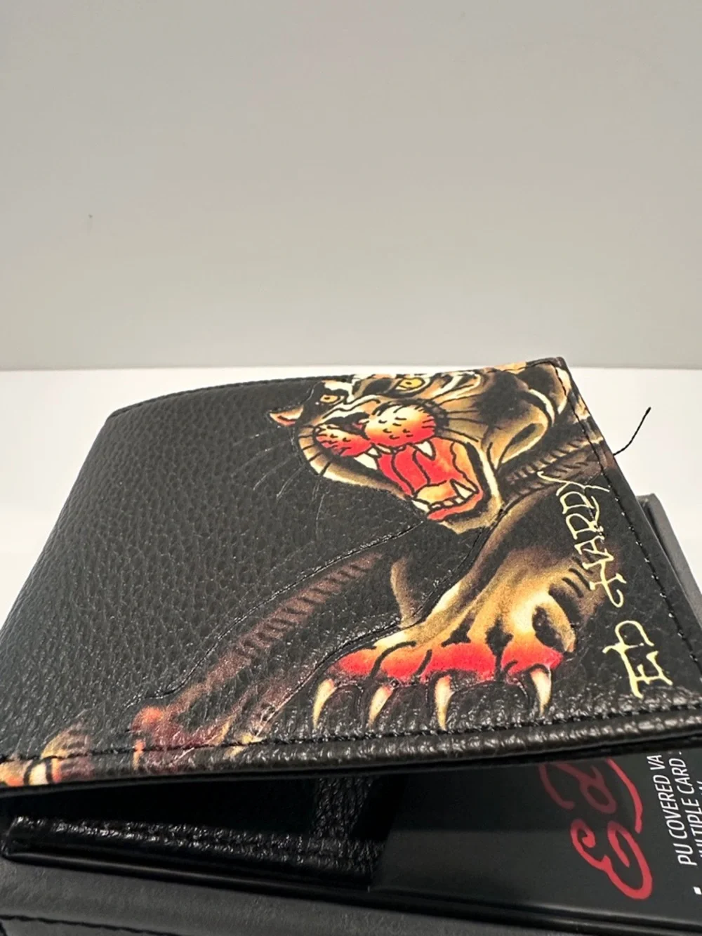 NWT Ed Hardy Men’s Bifold Wallet with Card, ID, Coin and Bill slots.